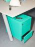 Detail of a Unibox collection of drawers under an office desk